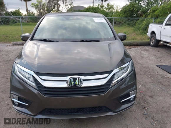 2020 Honda Odyssey Elite with VIN 5FNRL6H91LB030294, listed as a IAAI auction lot 41608291 with 74,477 mi miles and . Bid and sale history available at DreamBid. Image 12.