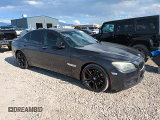 2011 BMW 7 Series 750i with VIN WBAKA8C59BCY36660, listed as a Copart auction lot 64260145 with 121,047 mi miles and Clean title. Bid and sale history available at DreamBid. Image 4.