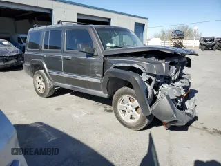 2006 Jeep Commander with VIN 1J8HH48K26C263986, listed as a Copart auction lot 84712294 with 216,923 mi miles and Salvage title. Bid and sale history available at DreamBid. Image 4.