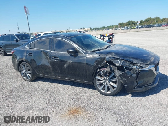 2020 Mazda 6 Touring with VIN JM1GL1VMXL1517828, listed as a IAAI auction lot 41511804 with 123,174 mi miles. Bid and sale history available at carsss.com. Image 6.