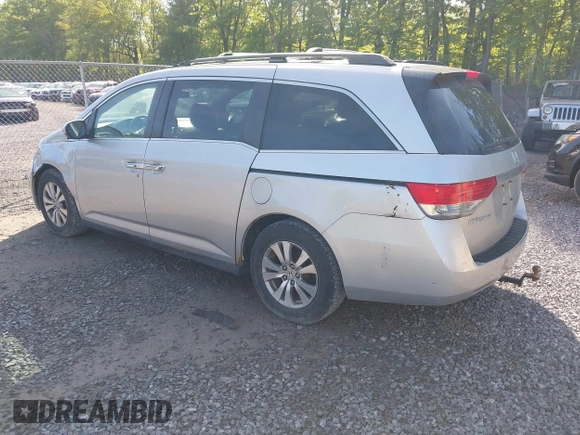 2014 Honda Odyssey EX-L with VIN 5FNRL5H61EB128311, listed as a IAAI auction lot 42334932 with 270,135 mi miles and . Bid and sale history available at DreamBid. Image 3.