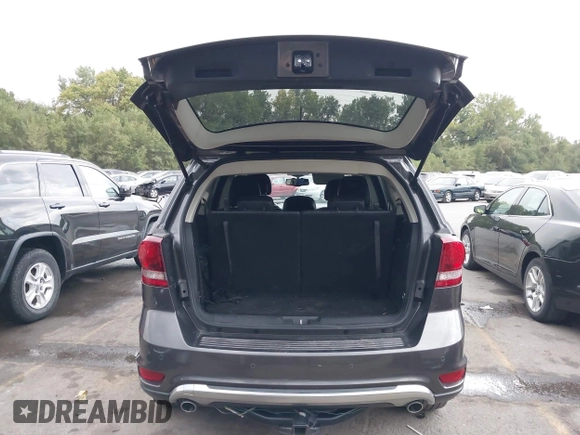 2017 Dodge Journey Crossroad Plus z VIN 3C4PDCGG6HT544668, wystawiony jako IAAI lot #40387483 z przebiegiem 61 712 mil mil oraz . Historia ofert i sprzedaży dostępna na DreamBid. Obrazek 18.
