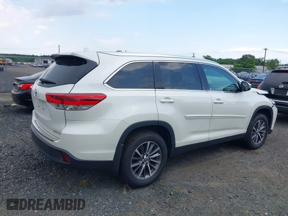 2019 Toyota Highlander SE with VIN 5TDJZRFH1KS567376, listed as a IAAI auction lot 42728105 with 58,970 mi miles and . Bid and sale history available at DreamBid. Image 4.