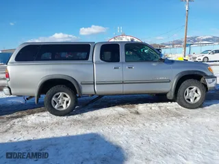 2002 Toyota Tundra SR5 with VIN 5TBBT44192S225410, listed as a IAAI auction lot 41402257 with 218,842 mi miles. Bid and sale history available at carsss.com. Image 13.