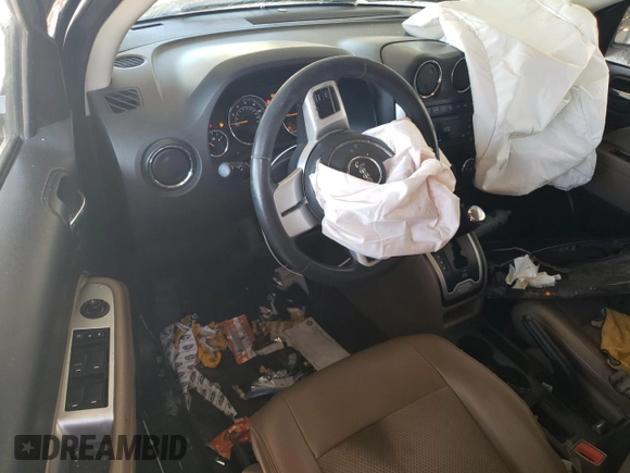 2015 Jeep Compass Latitude with VIN 1C4NJCEB3FD107415, listed as a Copart auction lot 74567454 with 140,342 mi miles and Salvage Title. Bid and sale history available at carsss.com. Image 8.