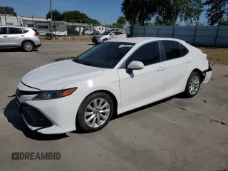2018 Toyota Camry LE с VIN 4T1B11HK5JU073663, выставлен на аукционе Copart как лот 55656575 с пробегом 100 578 миль миль и Списание • Salvage title. История ставок и продаж доступна на DreamBid. Изображение 1.