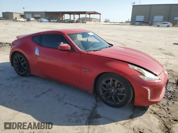 2016 Nissan 370Z with VIN JN1AZ4EH9GM933546, listed as a Copart auction lot 52158905 with 121,678 mi miles and Salvage Title. Bid and sale history available at carsss.com. Image 4.