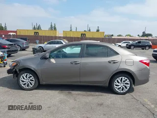 2018 Toyota Corolla L with VIN 5YFBURHE6JP774827, listed as a IAAI auction lot 42598086 with 29,400 mi miles and . Bid and sale history available at DreamBid. Image 14.