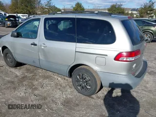2002 Toyota Sienna LE with VIN 4T3ZF13C52U450825, listed as a IAAI auction lot 41604636 with 179,495 mi miles. Bid and sale history available at carsss.com. Image 3.