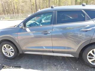 2017 Hyundai Tucson Value with VIN KM8J33A23HU405296, listed as a IAAI auction lot 41887237 with 114,027 mi miles. Bid and sale history available at carsss.com. Image 14.