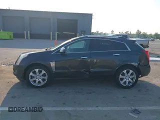 2014 Cadillac SRX Performance Collection with VIN 3GYFNFE35ES663320, listed as a IAAI auction lot 42480235 with 112,406 mi miles and . Bid and sale history available at DreamBid. Image 14.