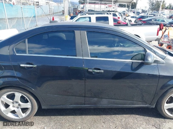 2015 Chevrolet Sonic LTZ with VIN 1G1JE5SB7F4103556, listed as a IAAI auction lot 41527541 with NaN miles. Bid and sale history available at carsss.com. Image 14.