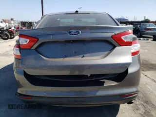 2013 Ford Fusion SE Hybrid z VIN 3FA6P0LUXDR362711, wystawiony jako Copart lot #57060425 z przebiegiem 155 031 mil mil oraz Szkoda całkowita • Salvage title. Historia ofert i sprzedaży dostępna na DreamBid. Obrazek 6.