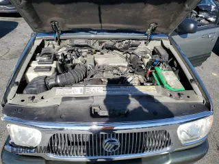 2000 Mercury Mountaineer z VIN 4M2DU86P0YUJ09470, wystawiony jako Copart lot #80207394 z przebiegiem 119 634 mil mil oraz Czysty tytuł • Clean title. Historia ofert i sprzedaży dostępna na DreamBid. Obrazek 12.