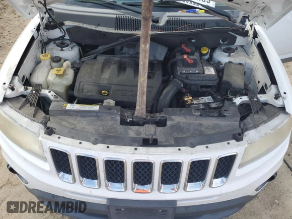 2011 Jeep Compass with VIN 1J4NT1FB8BD192088, listed as a Copart auction lot 79872304 with 150,547 mi miles and Clean Title. Bid and sale history available at carsss.com. Image 12.