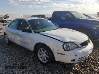 2000 Mercury Sable z VIN 1MEFM53U7YG640279, wystawiony jako Copart lot #70701264 z przebiegiem 118 790 mil mil oraz Szkoda całkowita • Salvage title. Historia ofert i sprzedaży dostępna na DreamBid. Obrazek 4.