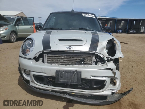 2015 MINI Convertible S z VIN WMWZP3C52FT298857, wystawiony jako Copart lot #58149145 z przebiegiem 52 777 mil mil oraz Szkoda całkowita • Salvage title. Historia ofert i sprzedaży dostępna na DreamBid. Obrazek 5.