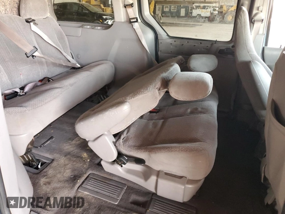 2001 Ford Windstar LX z VIN 2FMZA51481BA91579, wystawiony jako Copart lot #56981515 z przebiegiem 81 898 mil mil oraz Tytuł czysty. Historia ofert i sprzedaży dostępna na DreamBid. Obrazek 11.