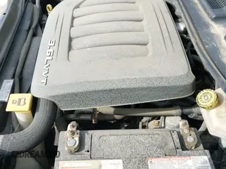 2013 Dodge Grand Caravan American Value with VIN 2C4RDGBG7DR704321, listed as a IAAI auction lot 43129116 with 287,644 mi miles and . Bid and sale history available at DreamBid. Image 13.