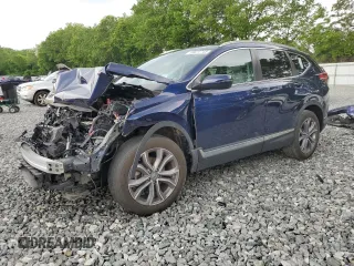 2020 Honda CR-V Touring z VIN 7FARW2H95LE000106, wystawiony jako Copart lot #59677745 z przebiegiem 40 201 mil mil oraz Szkoda całkowita • Salvage title. Historia ofert i sprzedaży dostępna na DreamBid. Obrazek 1.