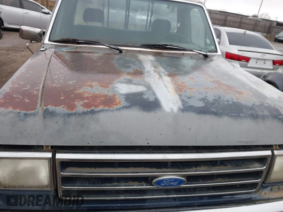 1990 Ford F-150 "S" with VIN 1FTDF15Y4LNB46798, listed as a IAAI auction lot 41767651 with 578,470 mi miles. Bid and sale history available at carsss.com. Image 10.