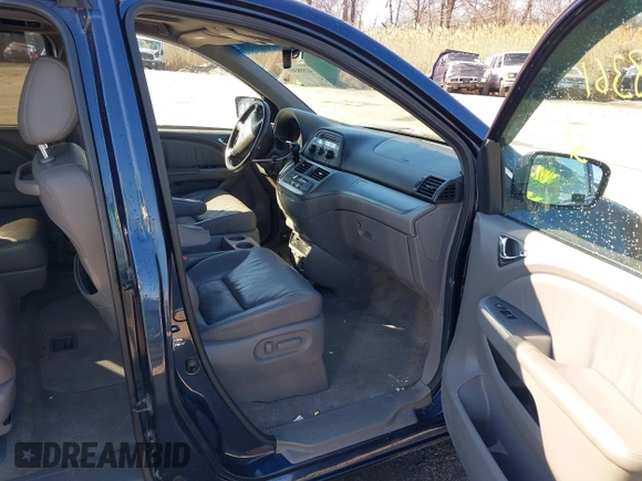 2010 Honda Odyssey EX-L with VIN 5FNRL3H76AB058912, listed as a IAAI auction lot 41558361 with 206,841 mi miles and . Bid and sale history available at DreamBid. Image 5.