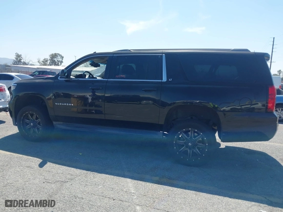 2015 Chevrolet Suburban LT with VIN 1GNSCJKC2FR281629, listed as a IAAI auction lot 41849300 with 133,842 mi miles. Bid and sale history available at carsss.com. Image 14.