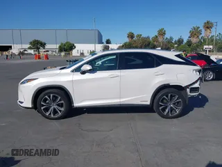 2021 Lexus RX 450h with VIN 2T2HGMDA2MC071281, listed as a IAAI auction lot 42587770 with 88,009 mi miles and . Bid and sale history available at DreamBid. Image 14.