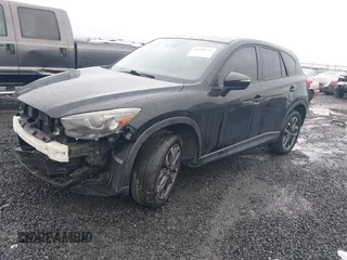 2016 Mazda CX-5 Grand Touring z VIN JM3KE4DY5G0742686, wystawiony jako IAAI lot #41598719 z przebiegiem 117 643 mil mil oraz . Historia ofert i sprzedaży dostępna na DreamBid. Obrazek 2.