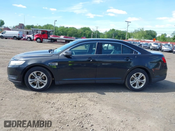 2015 Ford Taurus SEL with VIN 1FAHP2E88FG181055, listed as a IAAI auction lot 42307640 with 104,702 mi miles and . Bid and sale history available at DreamBid. Image 13.