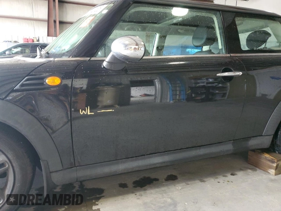 2012 MINI Hardtop with VIN WMWSU3C58CT369968, listed as a Copart auction lot 60102135 with 138,062 mi miles and Salvage title. Bid and sale history available at DreamBid. Image 13.