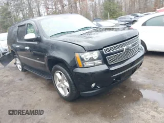 2012 Chevrolet Suburban LTZ with VIN 1GNSKKE74CR257156, listed as a IAAI auction lot 41486869 with 168,049 mi miles. Bid and sale history available at carsss.com. Image 1.