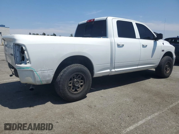 2019 Ram 1500 Big Horn with VIN 1C6RR7TT8KS609377, listed as a Copart auction lot 60875495 with 128,933 mi miles and Salvage title. Bid and sale history available at DreamBid. Image 3.