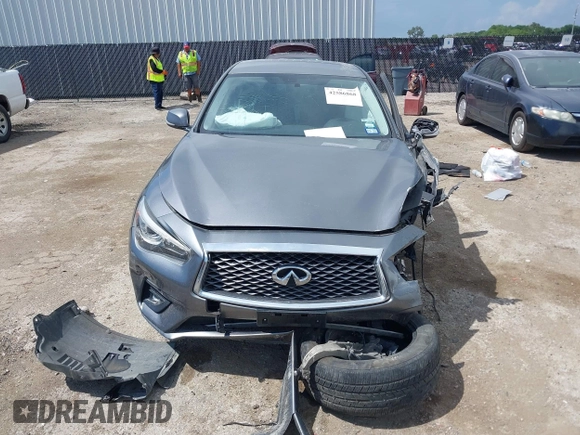 2021 Infiniti Q50 Pure with VIN JN1EV7AP7MM700241, listed as a IAAI auction lot 42586868 with 96,046 mi miles and . Bid and sale history available at DreamBid. Image 12.