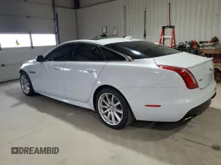 2016 Jaguar XJ R-Sport with VIN SAJWJ1CDXG8W00145, listed as a Copart auction lot 49901234 with 76,629 mi miles and . Bid and sale history available at DreamBid. Image 2.