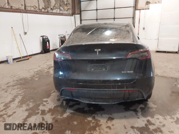 2024 Tesla Model Y Long Range with VIN 7SAYGDEE0RA282634, listed as a IAAI auction lot 41627510 with 23,054 mi miles and . Bid and sale history available at DreamBid. Image 17.