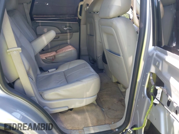 2014 Chevrolet Tahoe LT with VIN 1GNSCBE00ER147899, listed as a IAAI auction lot 42322761 with 299,342 mi miles and . Bid and sale history available at DreamBid. Image 8.