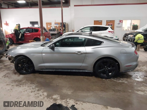 2021 Ford Mustang EcoBoost with VIN 1FA6P8TH1M5127800, listed as a IAAI auction lot 41625544 with 82,531 mi miles. Bid and sale history available at carsss.com. Image 15.