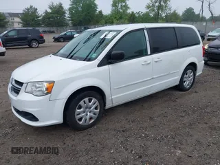 2015 Dodge Grand Caravan SE with VIN 2C4RDGBG2FR606610, listed as a IAAI auction lot 42197738 with 144,620 mi miles and . Bid and sale history available at DreamBid. Image 2.