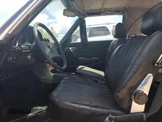 1980 Mercedes-Benz SL with VIN 10704412060233, listed as a Copart auction lot 63038205 with 26,039 mi miles and Clean title. Bid and sale history available at DreamBid. Image 7.