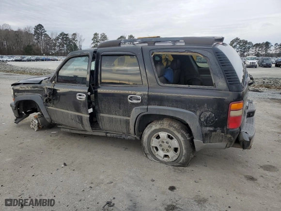 2003 Chevrolet Tahoe Z71 with VIN 1GNEK13T03R124255, listed as a Copart auction lot 42002945 with 205,965 mi miles and Salvage Title. Bid and sale history available at carsss.com. Image 2.