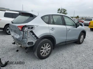 2016 Mazda CX-5 Sport with VIN JM3KE4BY1G0799275, listed as a Copart auction lot 51202355 with 98,409 mi miles and Non Repairable. Bid and sale history available at carsss.com. Image 3.