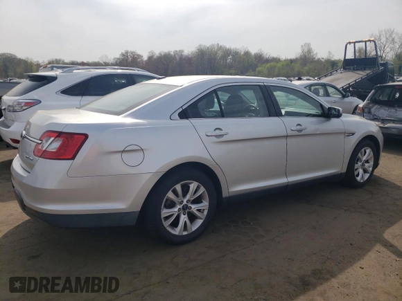 2012 Ford Taurus SEL z VIN 1FAHP2HW4CG129105, wystawiony jako Copart lot #54708445 z przebiegiem 201 450 mil mil oraz Szkoda całkowita • Salvage title. Historia ofert i sprzedaży dostępna na DreamBid. Obrazek 3.