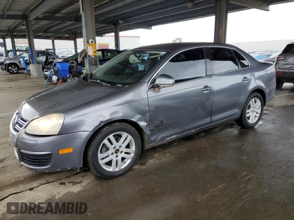 2007 Volkswagen Jetta z VIN 3VWDG71K47M101262, wystawiony jako Copart lot #51469695 z przebiegiem 241 174 mil mil oraz Szkoda całkowita • Salvage title. Historia ofert i sprzedaży dostępna na DreamBid. Obrazek 1.