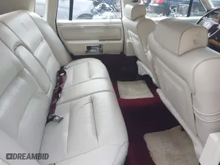 1987 Lincoln Town Car with VIN 1LNBM81F5HY704217, listed as a IAAI auction lot 41855678 with 86,794 mi miles. Bid and sale history available at carsss.com. Image 8.