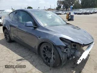 2023 Tesla Model Y Long Range with VIN 7SAYGDEE4PF899390, listed as a Copart auction lot 54361685 with Not Provided miles and Clean Title. Bid and sale history available at DreamBid. Image 4.
