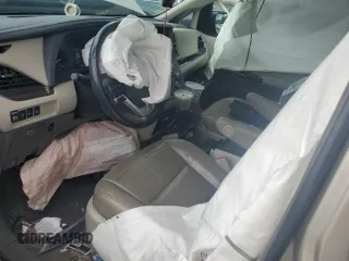 2016 Toyota Sienna XLE with VIN 5TDYK3DC0GS697468, listed as a Copart auction lot 51186795 with 128,851 mi miles and Salvage Title. Bid and sale history available at DreamBid. Image 7.