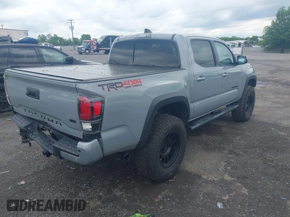 2021 Toyota Tacoma SR with VIN 5TFCZ5AN3MX258746, listed as a IAAI auction lot 42252967 with 62,095 mi miles and . Bid and sale history available at DreamBid. Image 4.