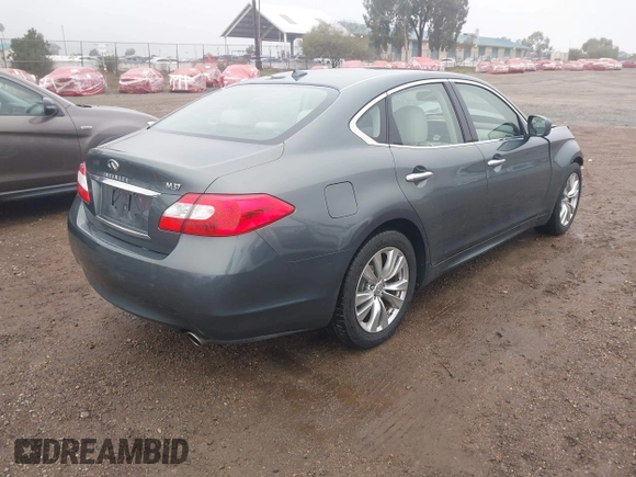 2012 Infiniti M37 with VIN JN1BY1AP8CM331234, listed as a IAAI auction lot 41524316 with 74,052 mi miles. Bid and sale history available at carsss.com. Image 4.