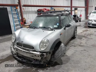 2002 MINI Hardtop with VIN WMWRC33422TC37296, listed as a IAAI auction lot 41385046 with 107,663 mi miles and . Bid and sale history available at DreamBid. Image 2.